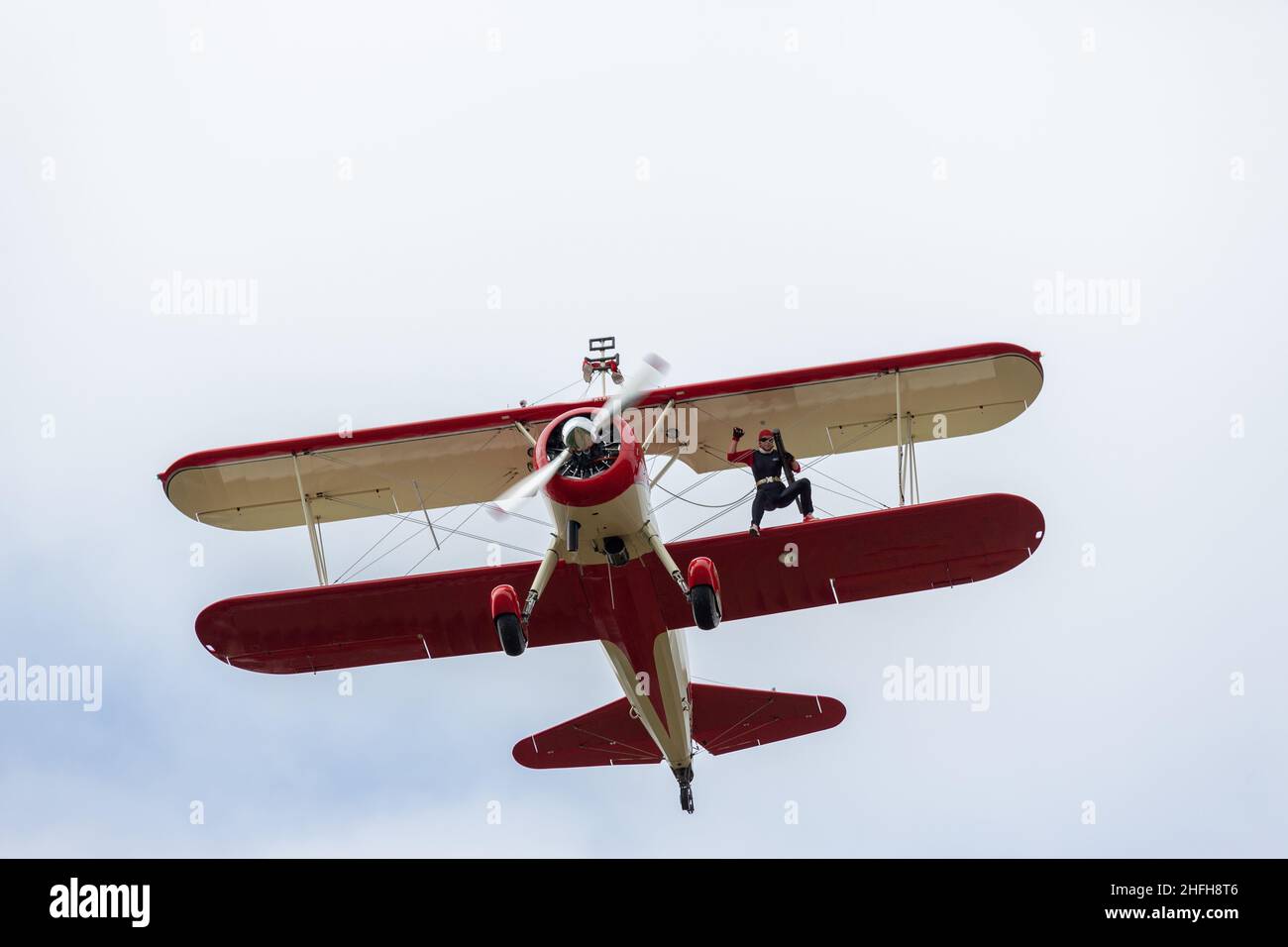 Aerobatics combined with a wingwalk on a biplane Stock Photo