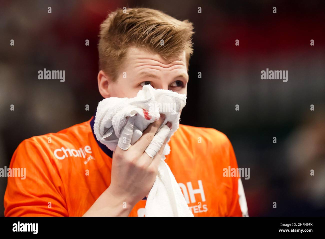 BUDAPEST, HUNGARY - JANUARY 16: Ivar Stavast of the Netherlands bleeds from his mouth during the Men's EHF Euro 2022 Group B match between Iceland and the Netherlands at the MVM Dome on January 16, 2022 in Budapest, Hungary (Photo by Henk Seppen/Orange Pictures) Stock Photo