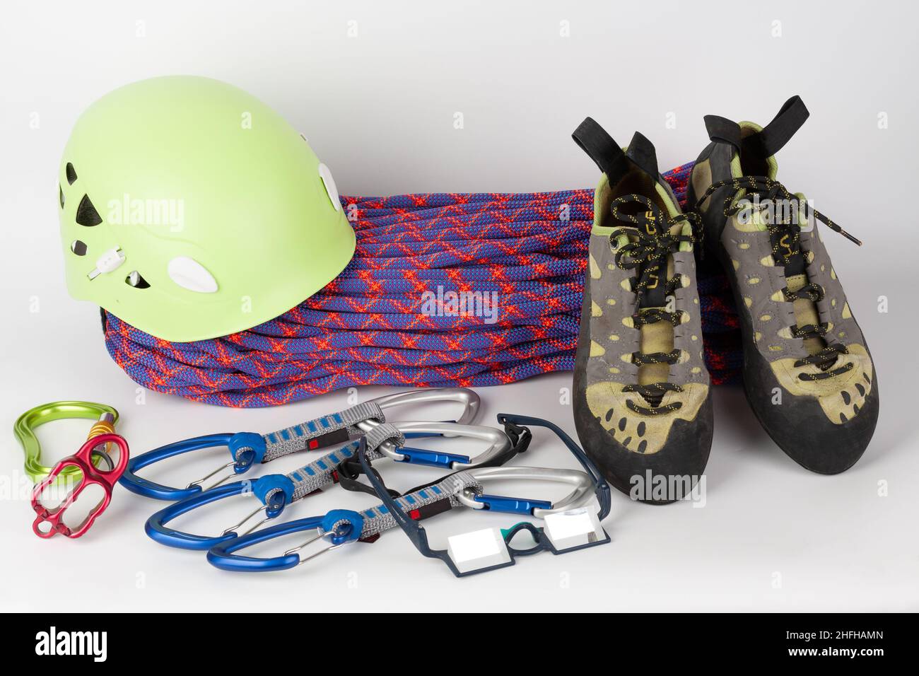 Three quick draws, belay device, climbing footwear, dynamic rope