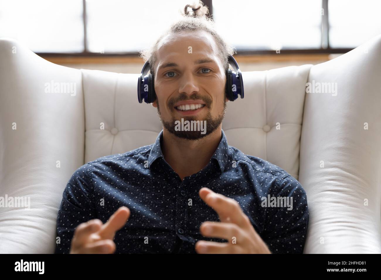 Smiling young handsome man holding video call. Stock Photo
