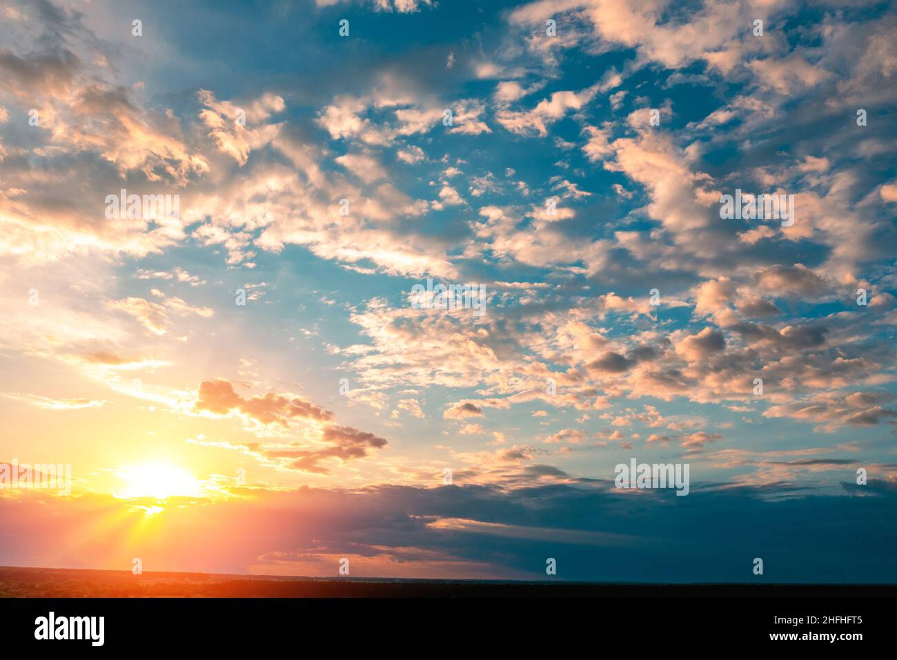 Colorful cloudy sky at sunset. Gradient color. Sky texture