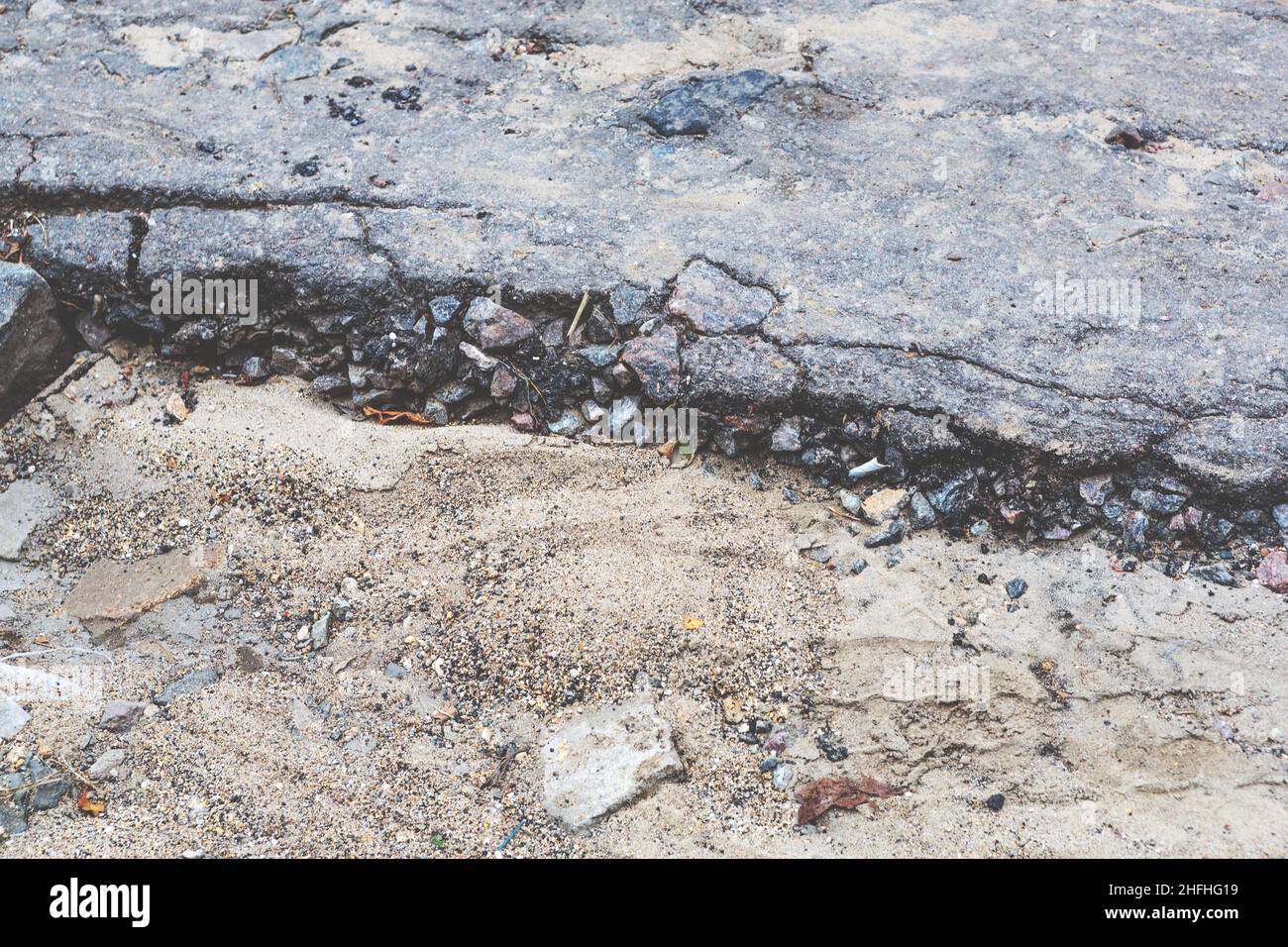 Damaged cobblestone road pavement hi-res stock photography and images ...