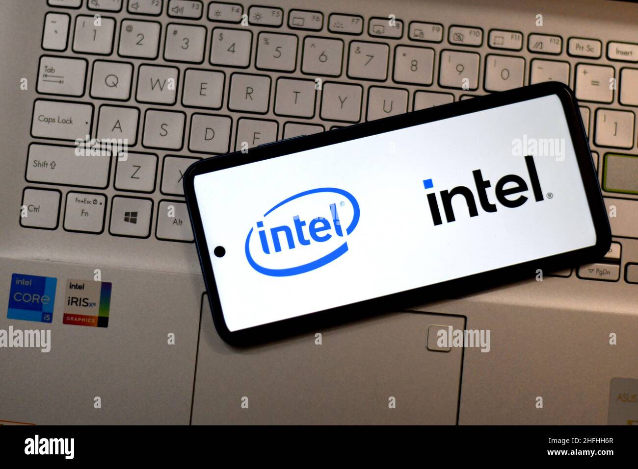 In this photo illustration, an Intel logo seen displayed on a ...