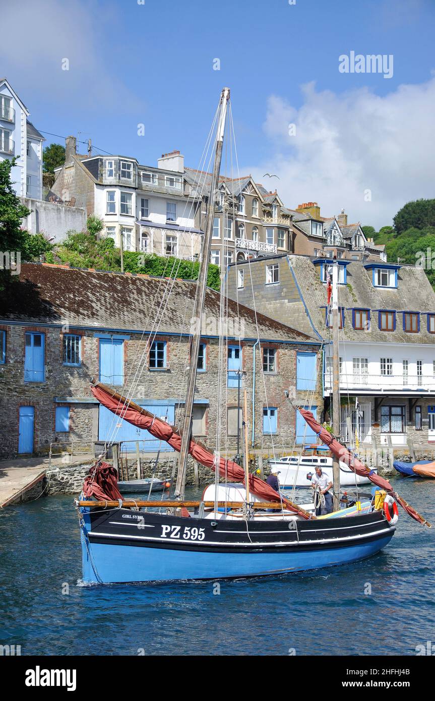 Wooden yacht leaving harbour, Looe, Cornwall, England, United Kingdom