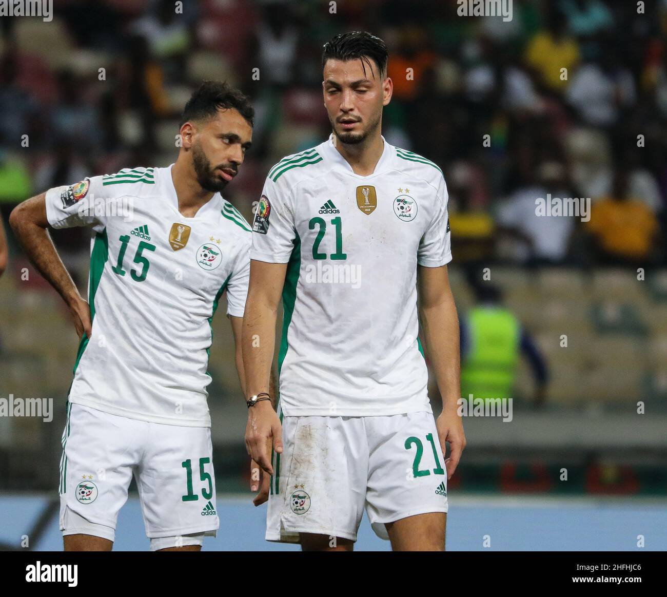Douala, CAMEROON - JANUARY 16: Farid Boulaya and Ramy Bensebaini of Algeria gestures during the Africa Cup of Nations group E match between Algeria and Equatorial Guinea at Stade de Japoma on January 16 2022 in Douala, Cameroon. (Photo by SF) Credit: Sebo47/Alamy Live News Stock Photo