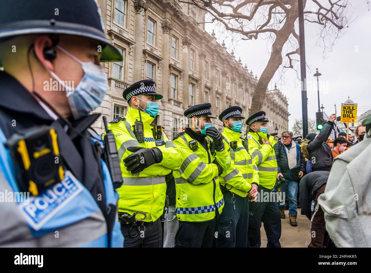 A line of police officers on the Whitehall during 'Kill the Bill' demonstration. London, England, UK 15.01.2022 Stock Photo