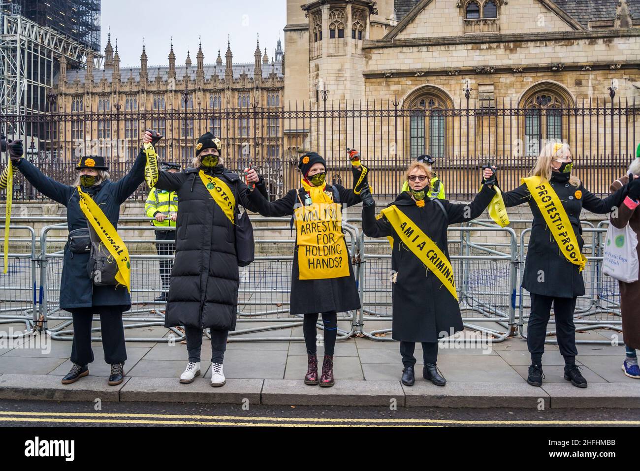 Women dressed as suffragettes take part in 'Kill the Bill' demonstration in front of the Houses of Parliament, ahead of a vote in the House of Lords. The bill on Police, Crime, Sentencing and Courts poses a threat to the right to protest. London, England, UK 15.01.2022 Stock Photo