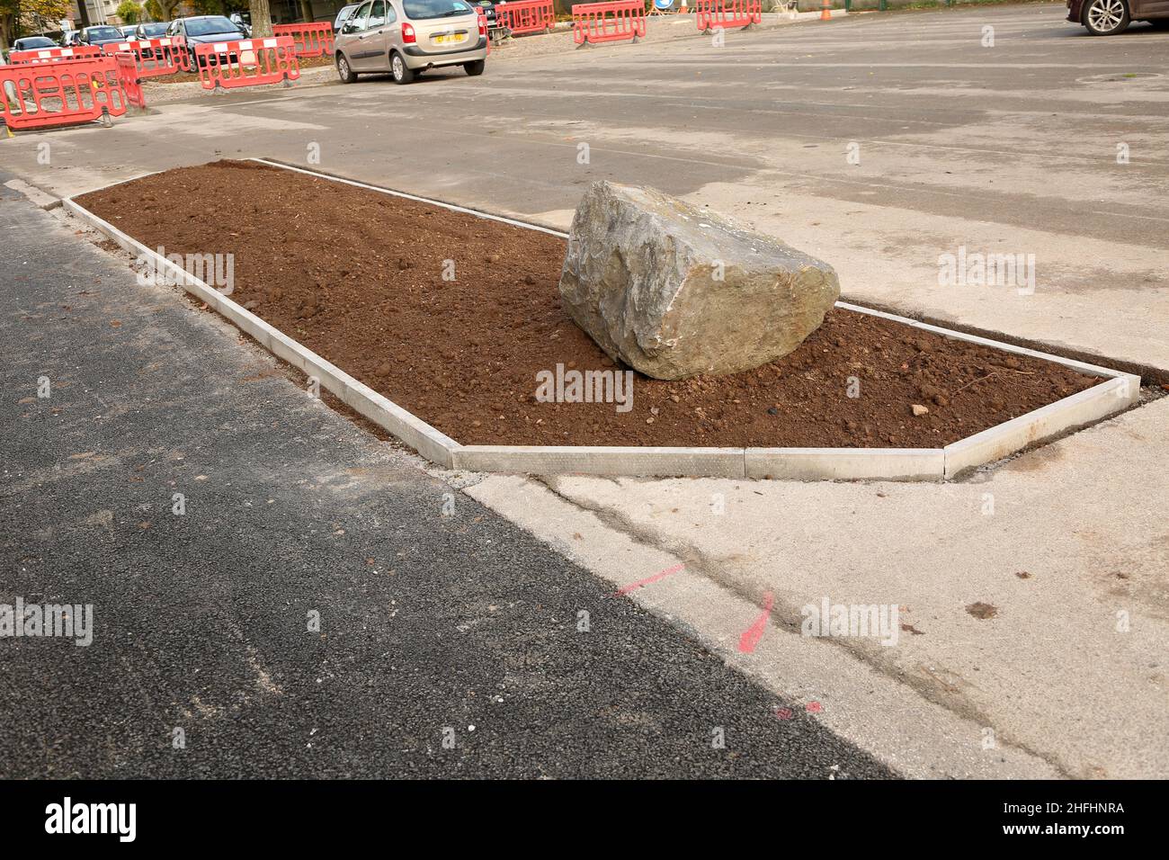 October 2015 - New raised flower bed in a car park Stock Photo