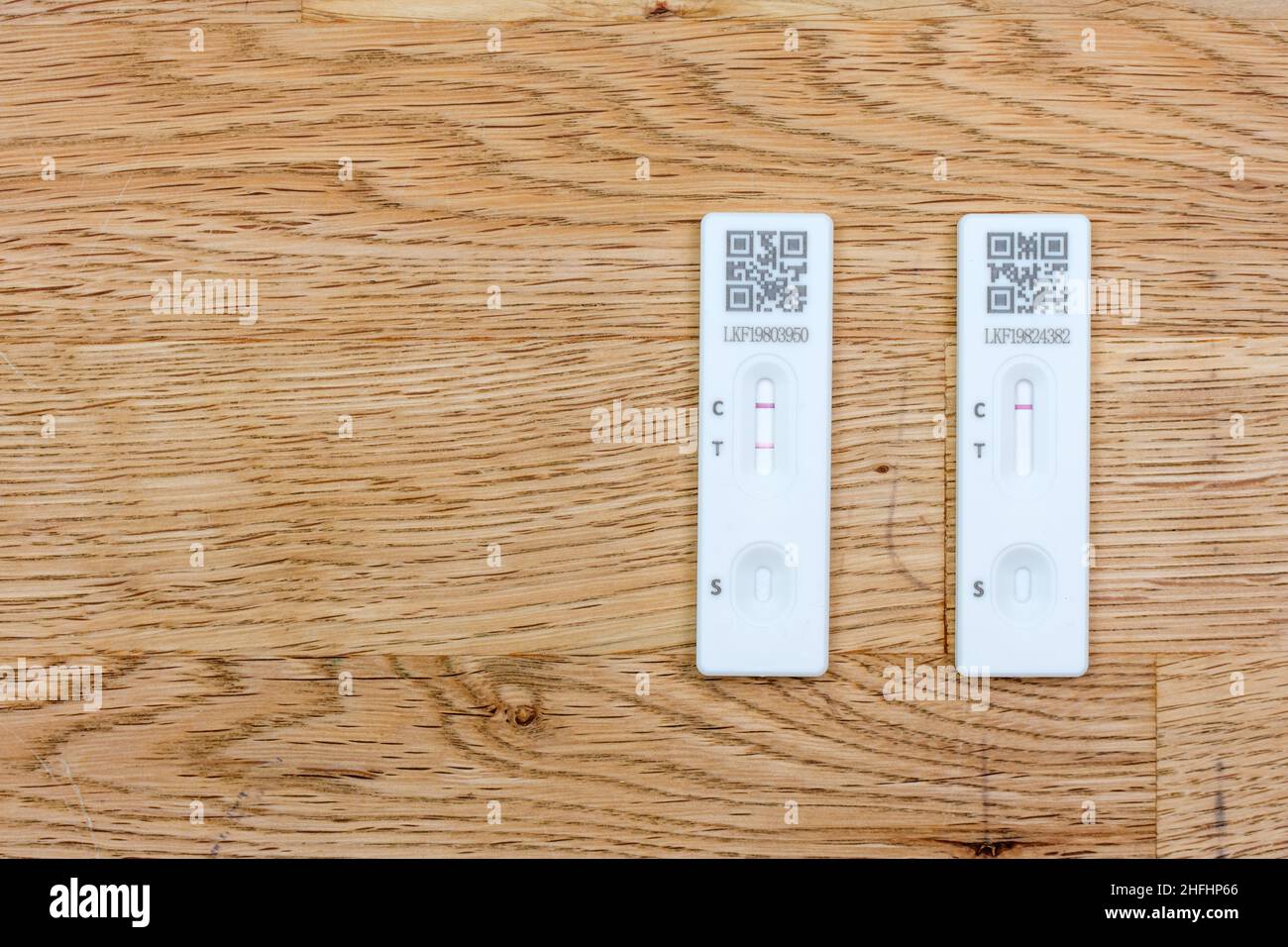 Positive and negative lateral flow device tests Stock Photo