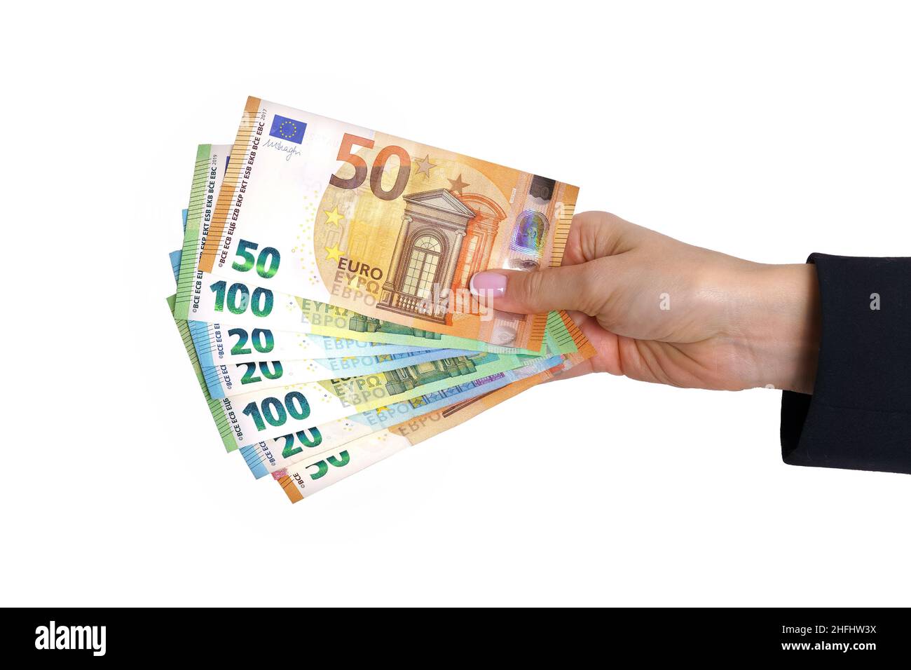 Woman hand holding euro cash money isolated on white background Stock ...