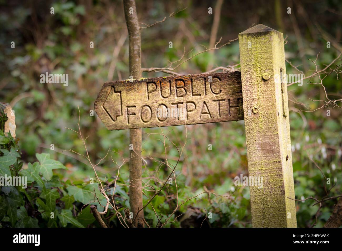 A deteriorating public footpath signpost Stock Photo