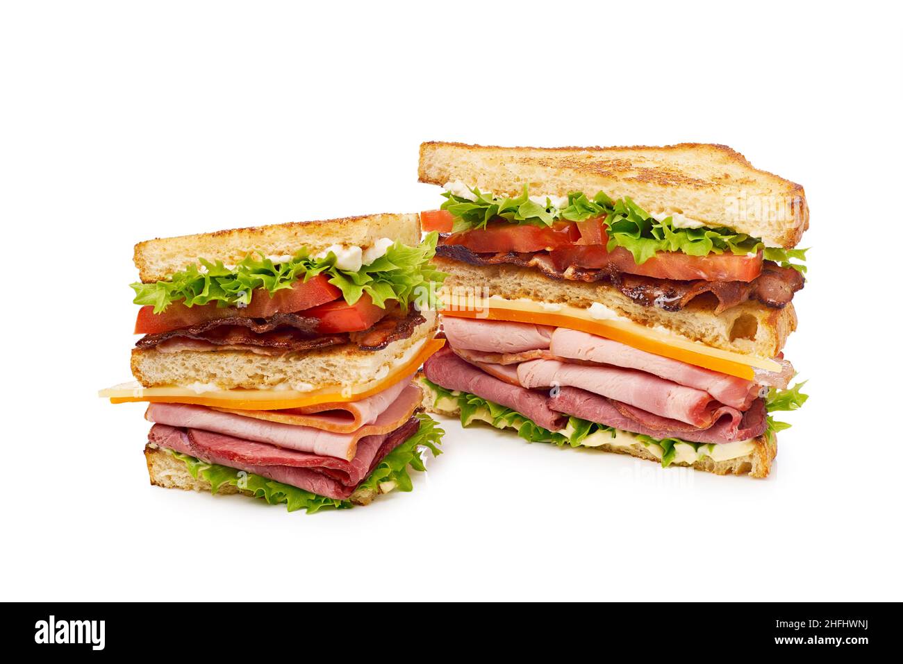 Two pieces of club sandwich on white Stock Photo