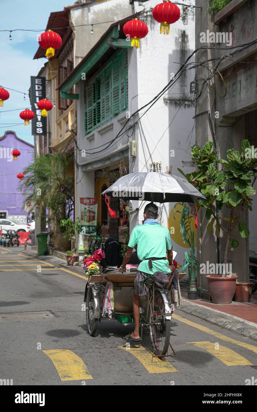 Georgetown, Penang, Malaysia - Jan 2nd 2022: Trishaw on Armenian Street of George Town Penang Malaysia. Stock Photo