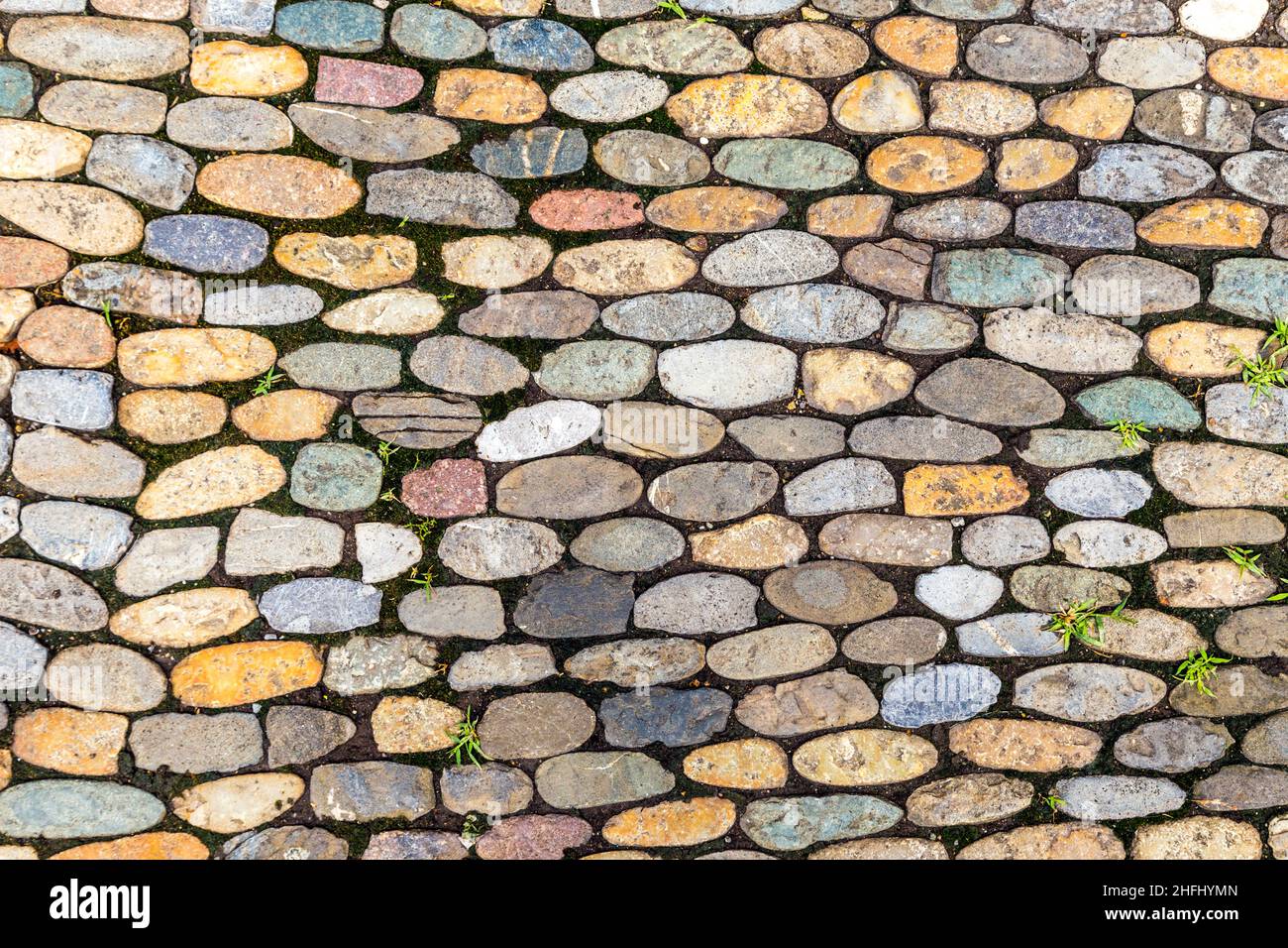 Abstract background of cobblestone pavement Stock Photo - Alamy