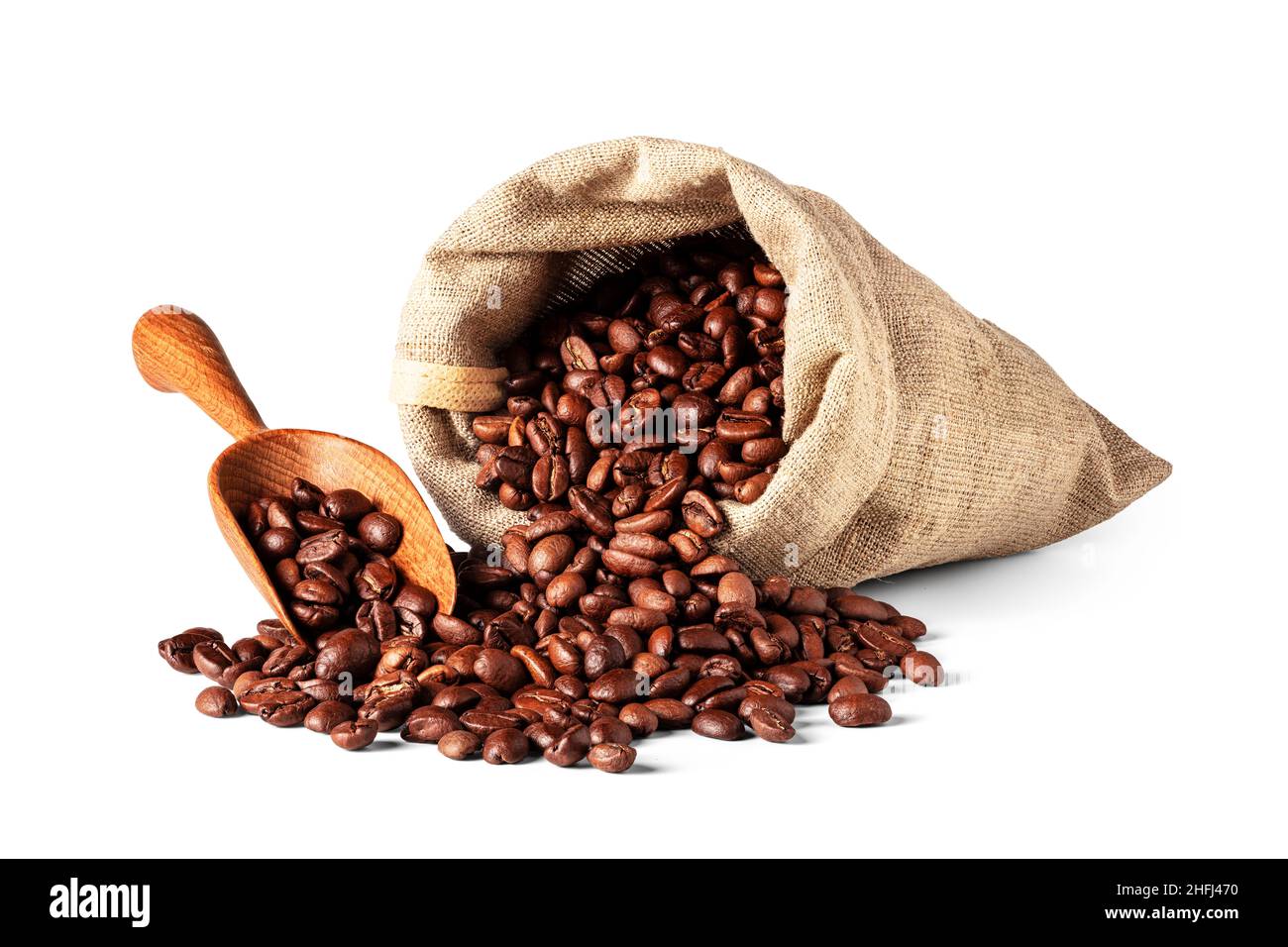 Burlap bag with coffee beans and wood scoop isolated on white background Stock Photo