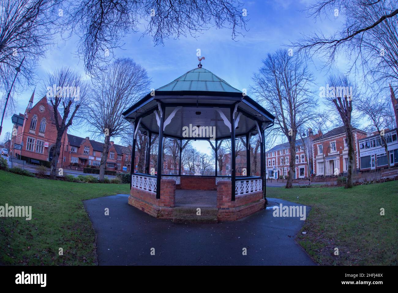 Redditch Bandstand, Church Green, Redditch. Worcestershire. Built in Church Green in 1883, the bandstand is octagonal with brick balustrades all the w Stock Photo