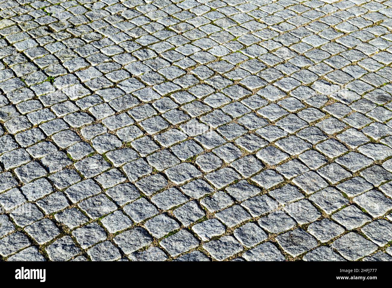 pattern of grey cobble stones at the paveway Stock Photo
