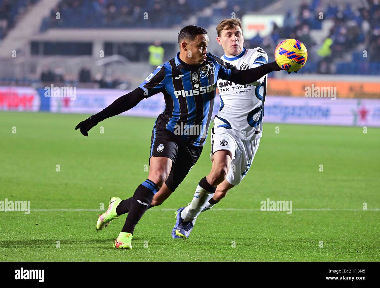 Bergamo, Italy. 16th Jan, 2022. FC Inter's Nicolo Barella (R) vies with Atalanta's Luis Muriel during a Serie A football match in Bergamo, Italy, Jan. 16, 2022. Credit: Str/Xinhua/Alamy Live News Stock Photo