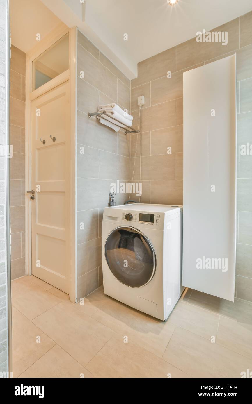 Laundry interior design in a luxury house Stock Photo - Alamy