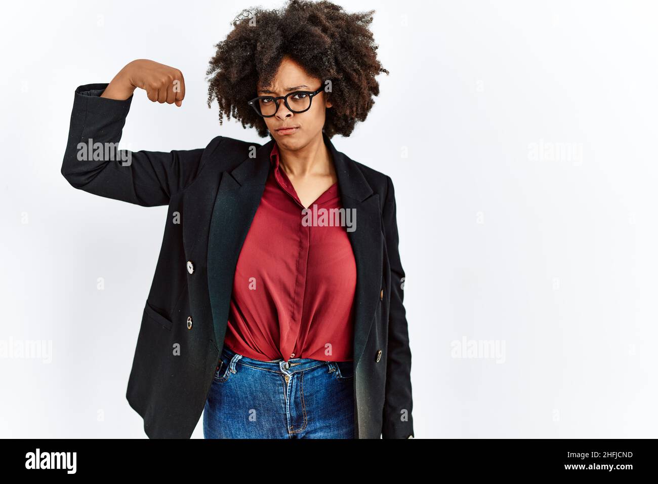 African american woman with afro hair wearing business jacket and glasses strong person showing arm muscle, confident and proud of power Stock Photo - Alamy African american woman with afro hair wearing business jacket and glasses strong person showing arm muscle, confident and proud of power Stock Photo - Alamy