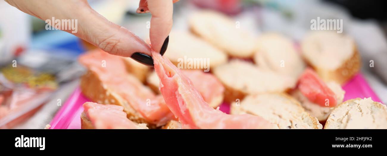 Finger food party woman hi-res stock photography and images - Alamy