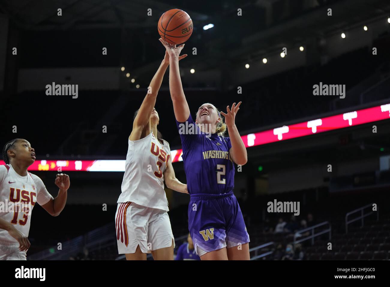 Washington Huskies forward Lauren Schwartz (2) shoots the ball against Southern California Trojans guard Tera Reed (3) during an NCAA college women's basketball game, Sunday, Jan. 16, 2022, in Los Angeles. USC defeated Washington 73-66. Stock Photo