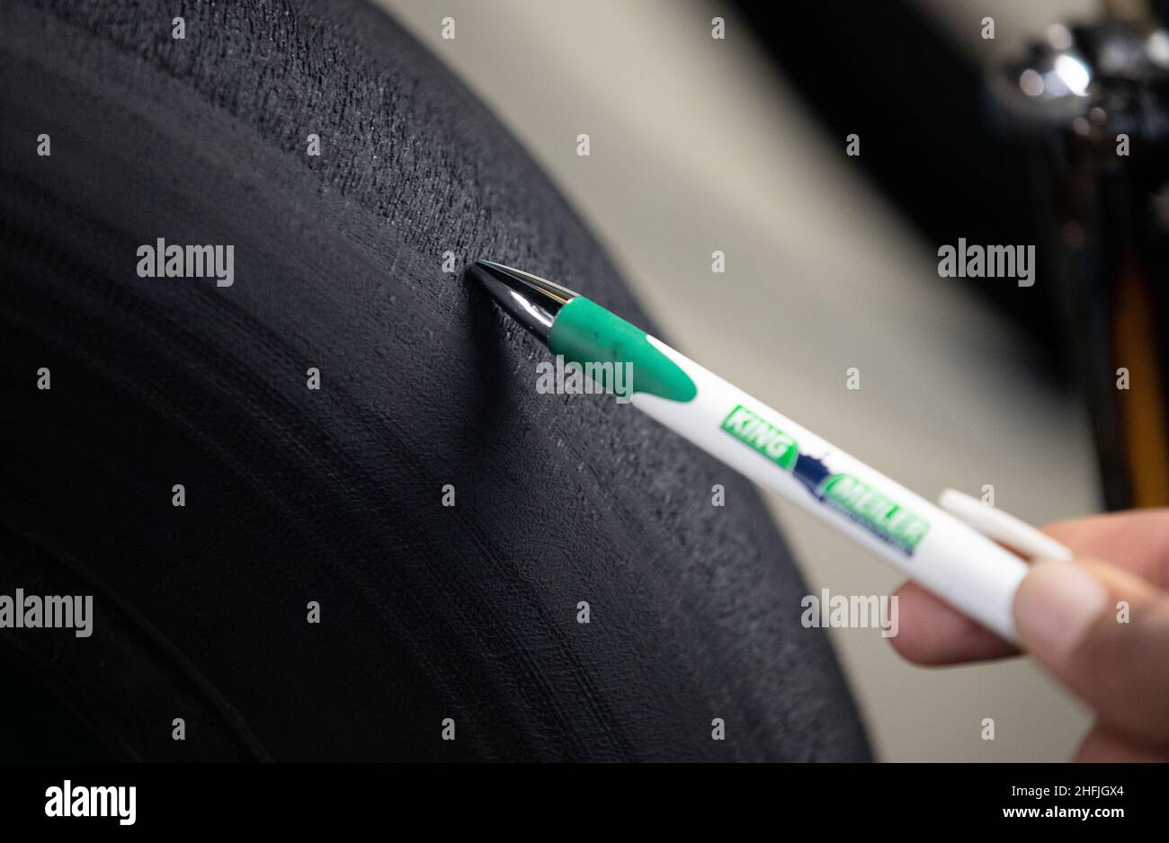 Dissen, Germany. 15th Dec, 2021. Used tires are prepared for