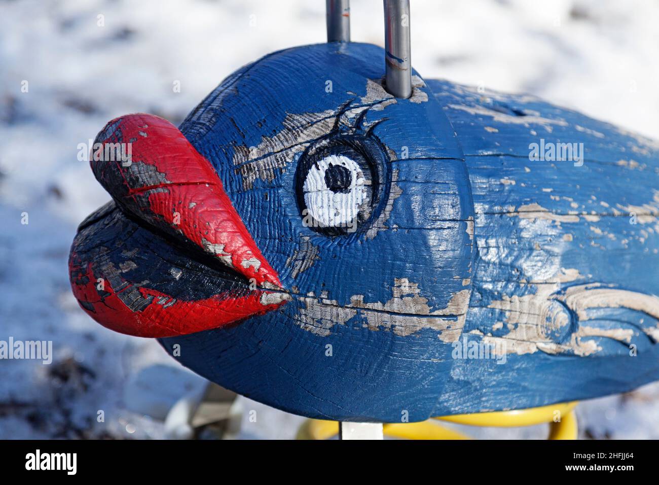 a fish made of wood that children can ride on the playground Stock ...