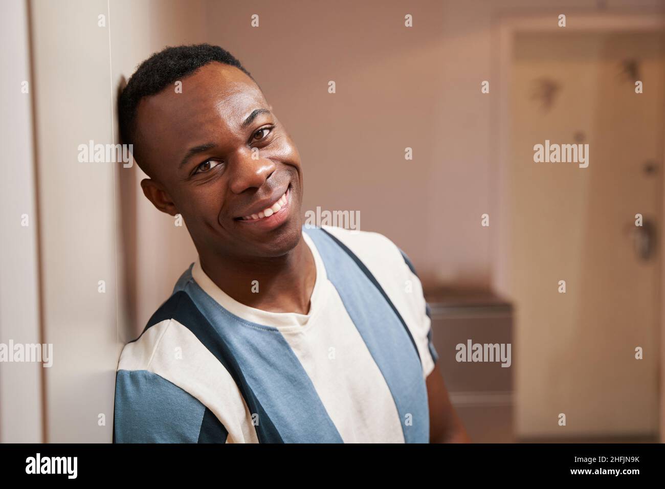 Happy multiracial man smiling hi-res stock photography and images - Alamy