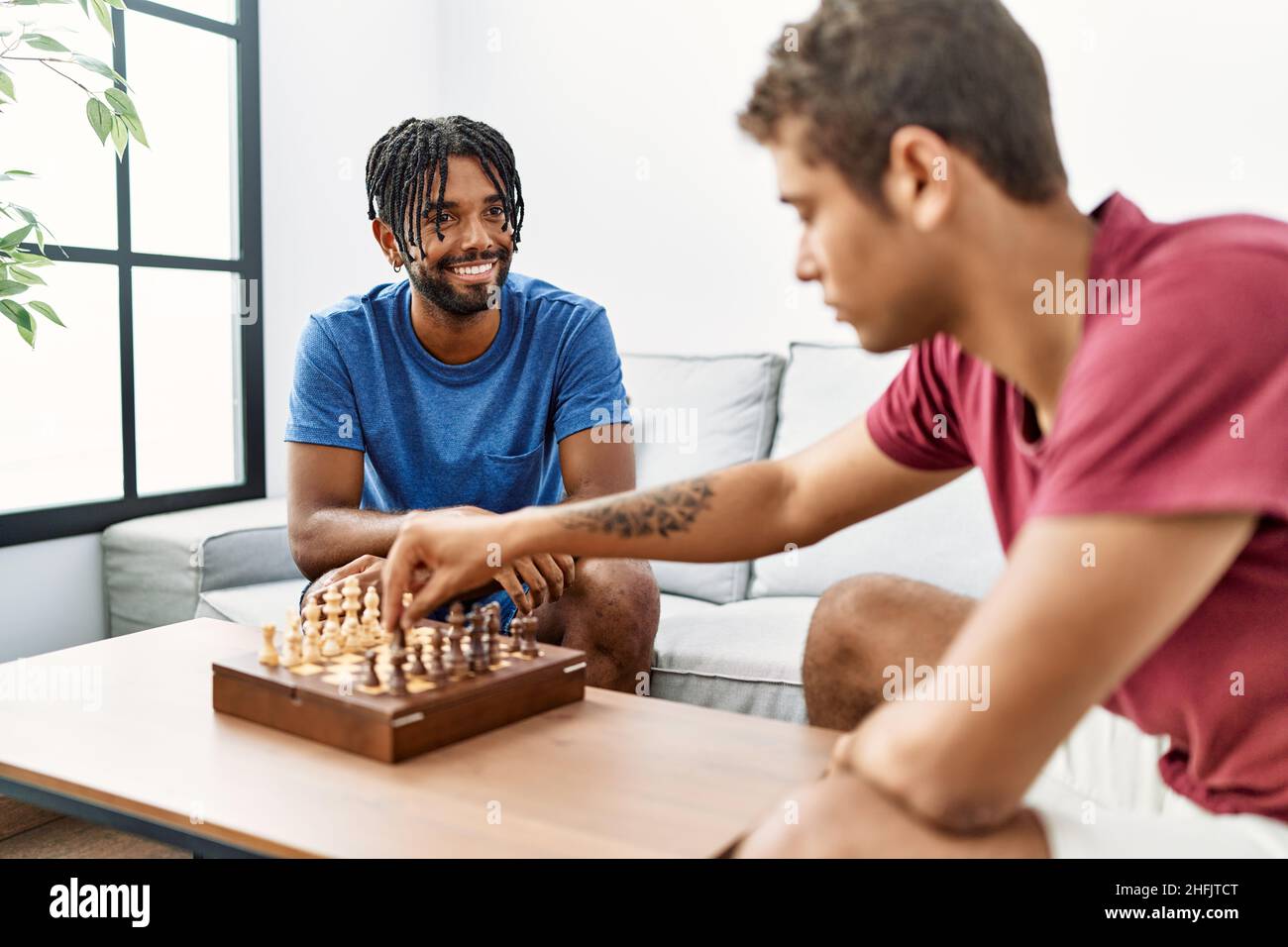 friends playing chess, Stock image