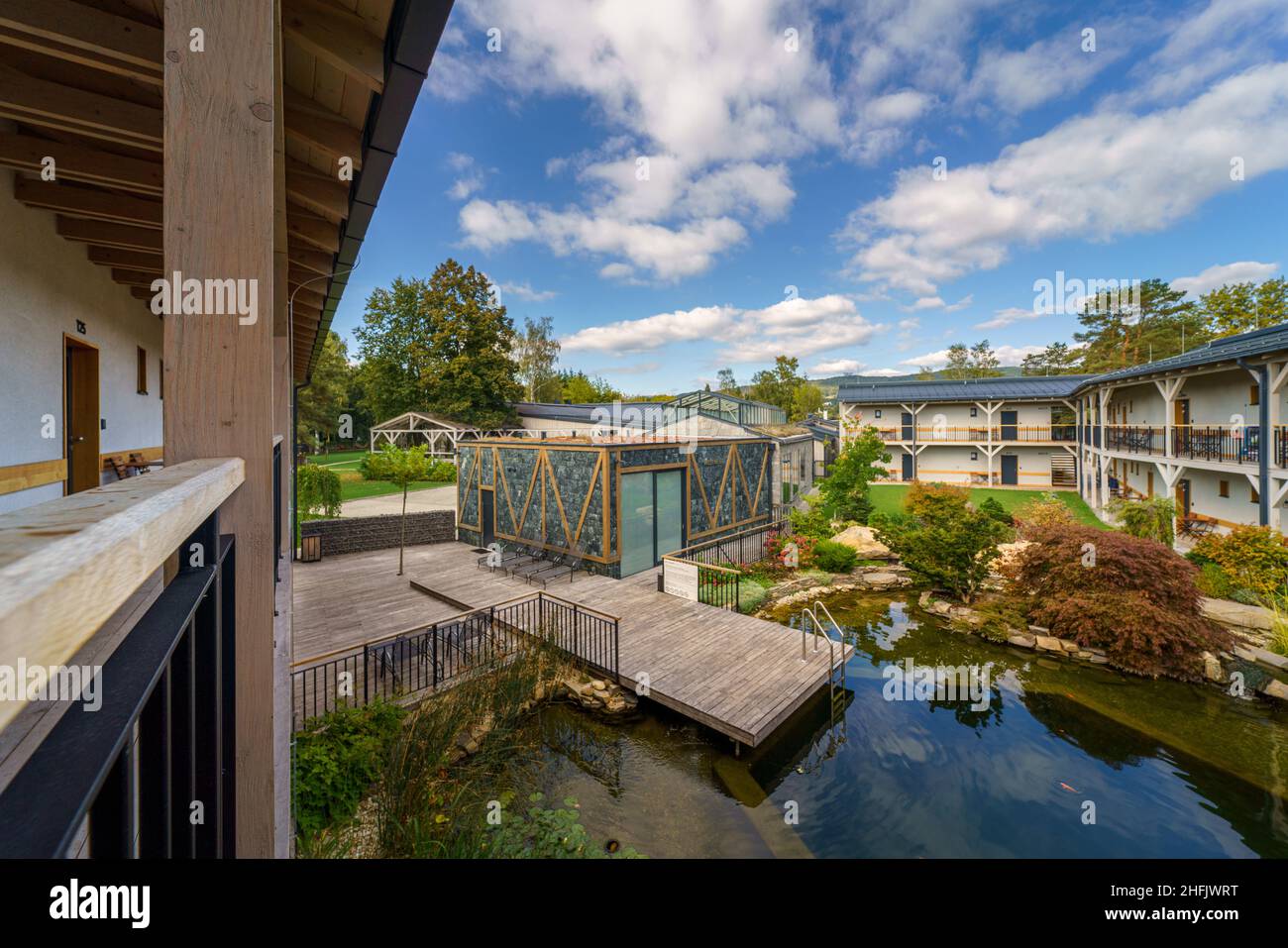 View from terrace of modern hotel with garden pond Stock Photo