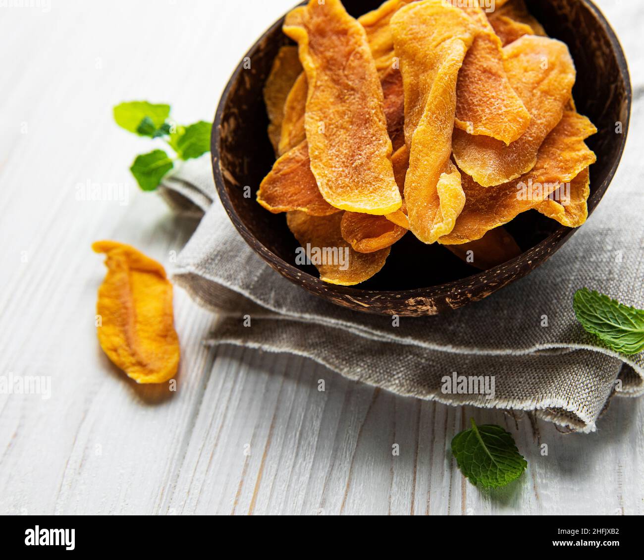 Dried Mango Fruit on Old Wooden Background Stock Photo