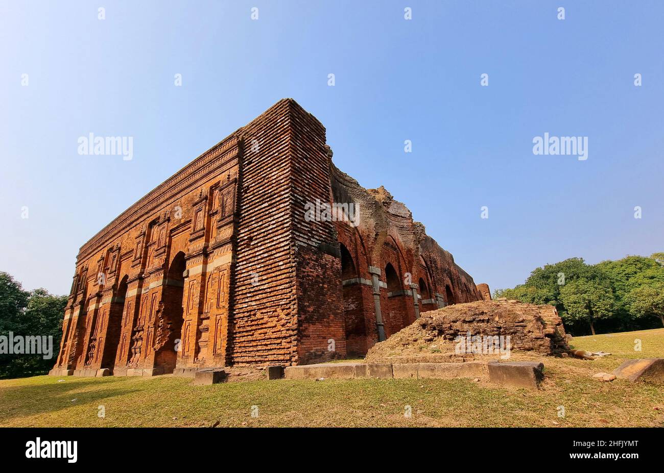 Remnants of different terracotta and brick mosques, built during the 12th to 16th century can be found in Naogaon and Chapai Nawabganj, both districts in Rajshahi Division. Modern Rajshahi lies in the ancient region of Pundravardhana. The foundation of the city dates to 1634, according to epigraphic records at the mausoleum of Sufi saint Shah Makdum. The area hosted a Dutch settlement in the 18th century. The Rajshahi municipality was constituted during the British Raj in 1876. Numerous mosques were built during the five and a half centuries of Muslim rule before the British colonial period, b Stock Photo