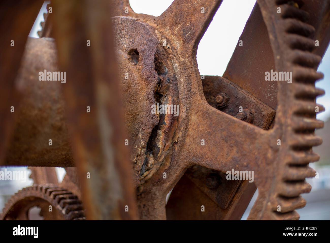 Details of a parts the moving parts of a rusty machine mechanical gear