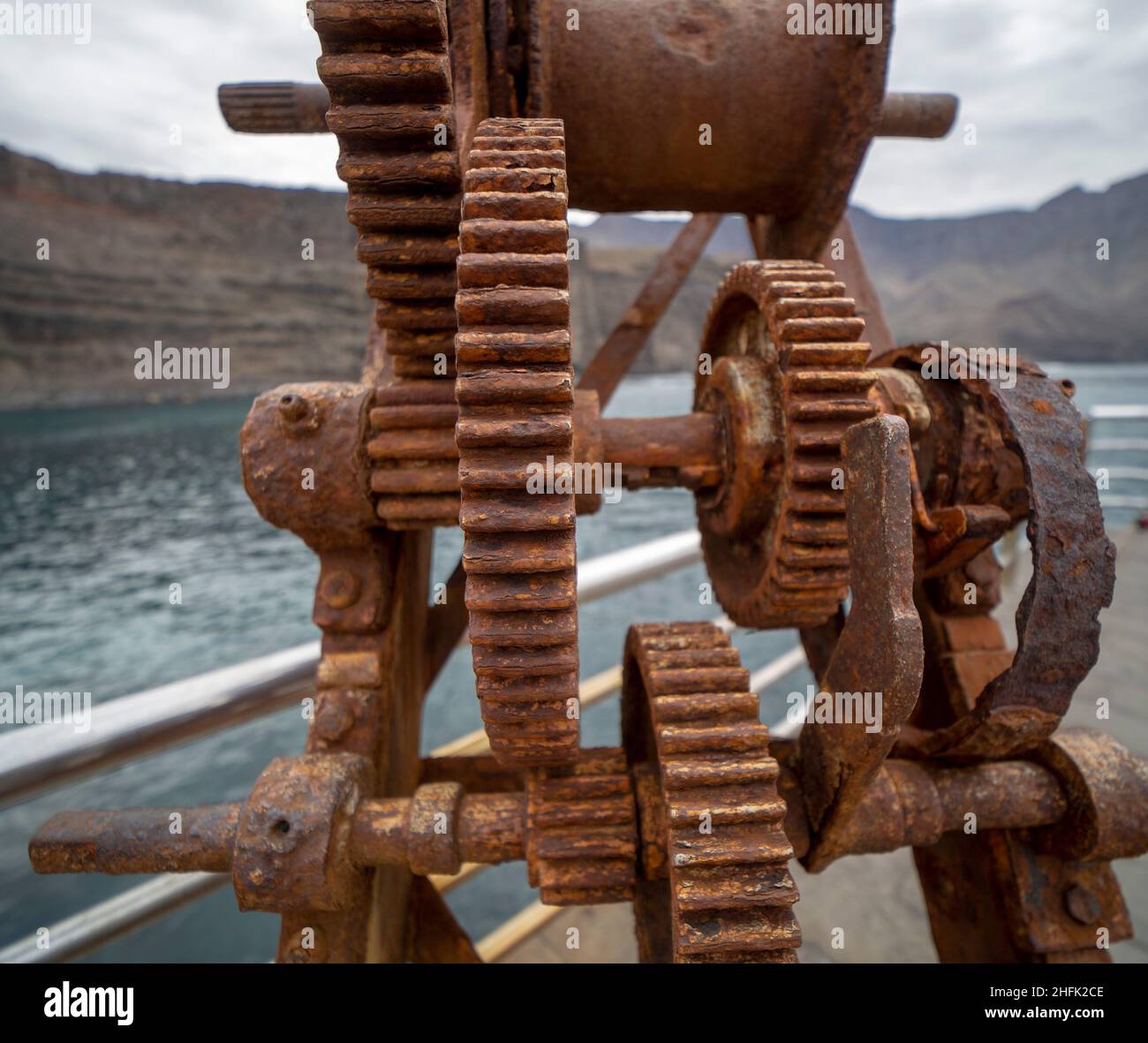 Details of a parts the moving parts of a rusty machine mechanical gear