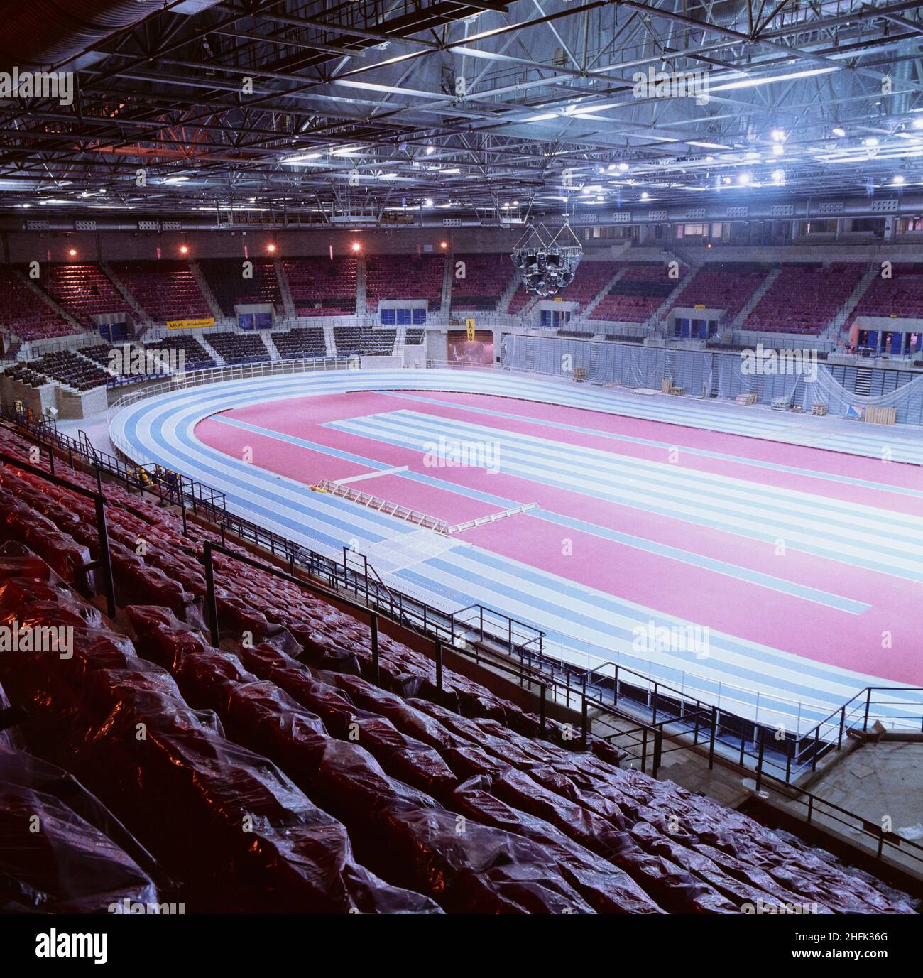 National Indoor Arena, King Edwards Road, Birmingham, c July 1991. An interior view of the National Indoor Arena in Birmingham close to its completion, with the track down in the event space. The negative register states that this image was supplied by Laing's Midland Region. I/N is also recorded next to the image, signifying that it is an internegative. It appears to have been copied from the original in July 1990, and was probably taken not long before this date. The &#xa3;50m Design and Construct contract for the National Indoor Arena (NIA) was awarded to the Laing Midlands Division by Birm Stock Photo