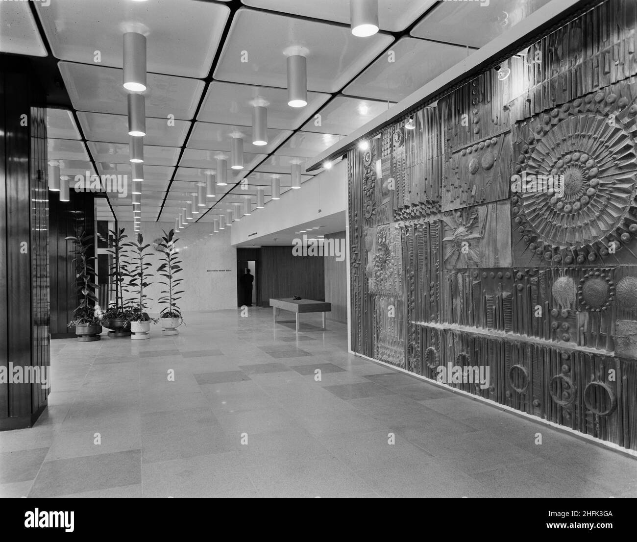 CIS Building, Cooperative Insurance Society Tower, Miller Street, Manchester, 16/10/1962. The main entrance foyer featuring an abstract wall mural in the Co-operative Insurance Society (CIS) Building in Manchester. In 1959, the Laing Company began work on the construction of two office blocks for the Co-operative Society in Manchester. The Co-operative Insurance Society (CIS) tower was over 350ft high when completed in 1962, and was the tallest office block in the country at the time. On an adjacent site, a smaller 14-storey high office block for the Co-operative Wholesale Society (CWS) was co Stock Photo