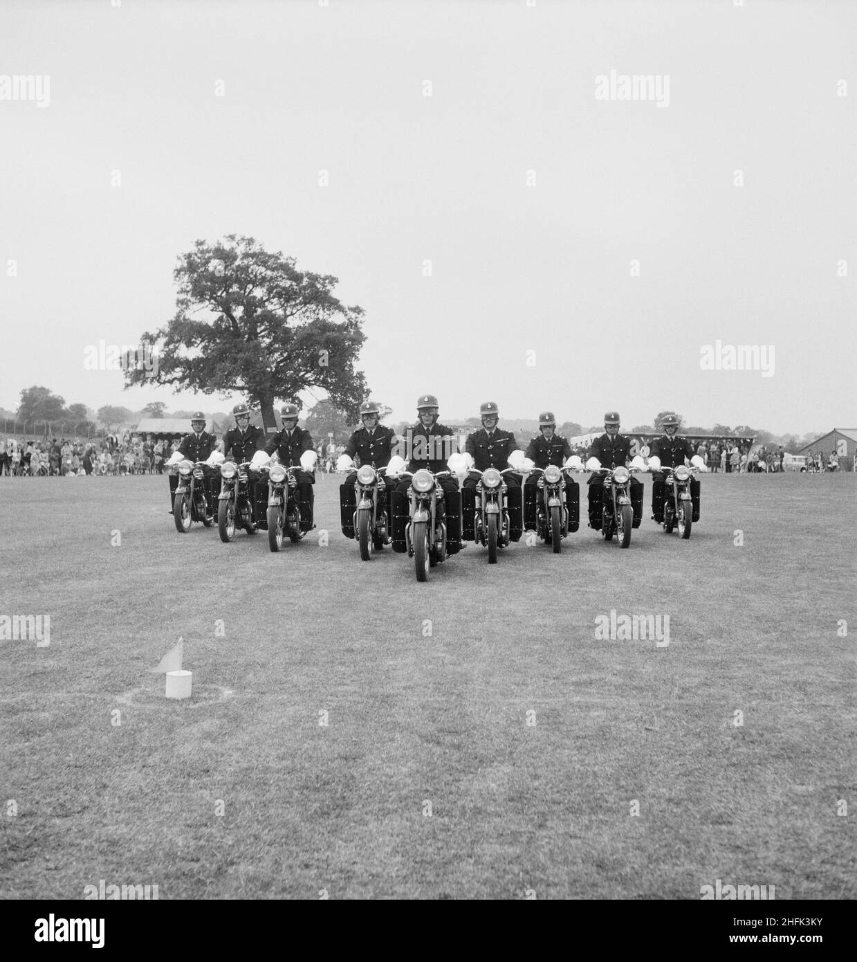 Laing Sports Ground, Rowley Lane, Elstree, Barnet, London, 17/06/1961. The Metropolitan Police Motorcycle Precision Ride Team putting on a demonstration at a Laing sports day at Elstree. This image was published in July 1961 in Laing's monthly newsletter 'Team Spirit'. Stock Photo