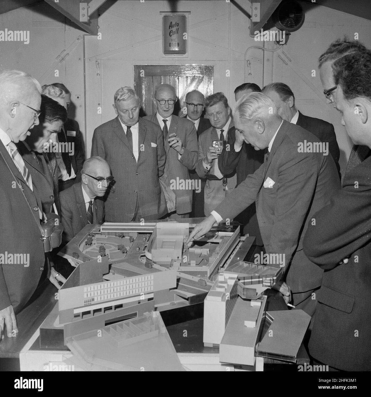 Bull Ring Centre, Birmingham, 02/07/1963. A group of councillors from Utrecht, Holland, being shown an architectural model of the Bull Ring Centre during a visit to the site. On Tuesday 2nd July 1963, 11 members of the City Council of Utrecht, Holland, and 7 officers, including the Director of Public Works and City Surveyor, visited the Bull Ring development. The councillors spent the morning with the Birmingham Corporation at the Civic Centre, followed by a lunch with representatives of the Birmingham Corporation and the Laing Development Company. In the afternoon, the councillors toured the Stock Photo