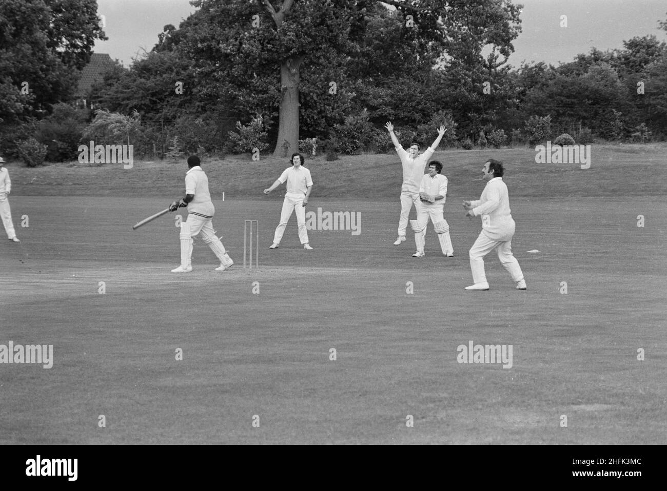 Laing Sports Ground, Rowley Lane, Elstree, Barnet, London, 21/07/1973. A cricket match being played between Laing's Sports Club and the Blue Circle cricket club. This photograph is part of a batch to show sports being played between members of Laing's Sports Club and staff from Blue Circle, the cement manufacturer. Stock Photo