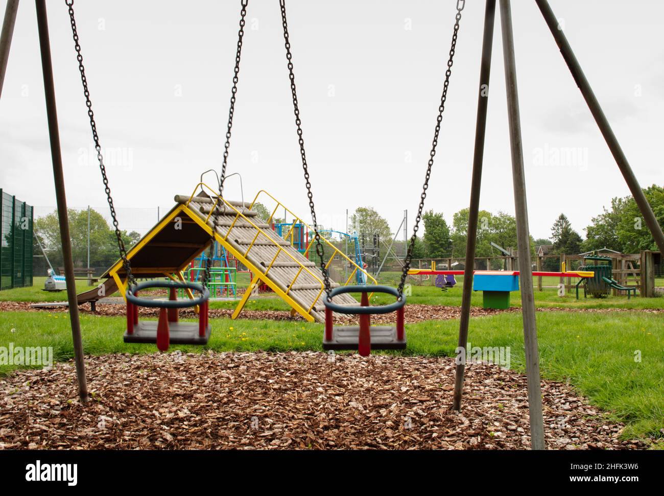 A view looking across the empty children's playground at Norwood Playing Field, during the Covid-19 lockdown. The Picturing Lockdown Collection was created during April and May 2020, in response to the Covid-19 pandemic. During seven days the public were asked to submit photographs that they felt best represented their experiences of lockdown in England, and from these submissions one hundred representing all the different geographic regions were chosen to be archived with Historic England. Alongside these images, ten artists were commissioned to produce their own images over the course of fiv Stock Photo