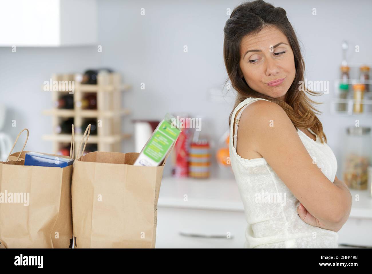 Woman exploring modern kitchen hi-res stock photography and images - Alamy