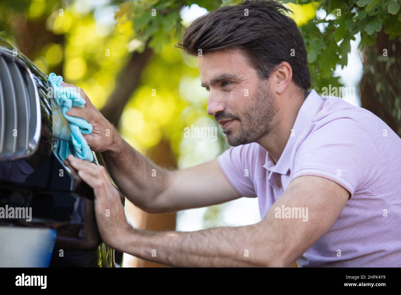 Man wiping car hires stock photography and images Alamy