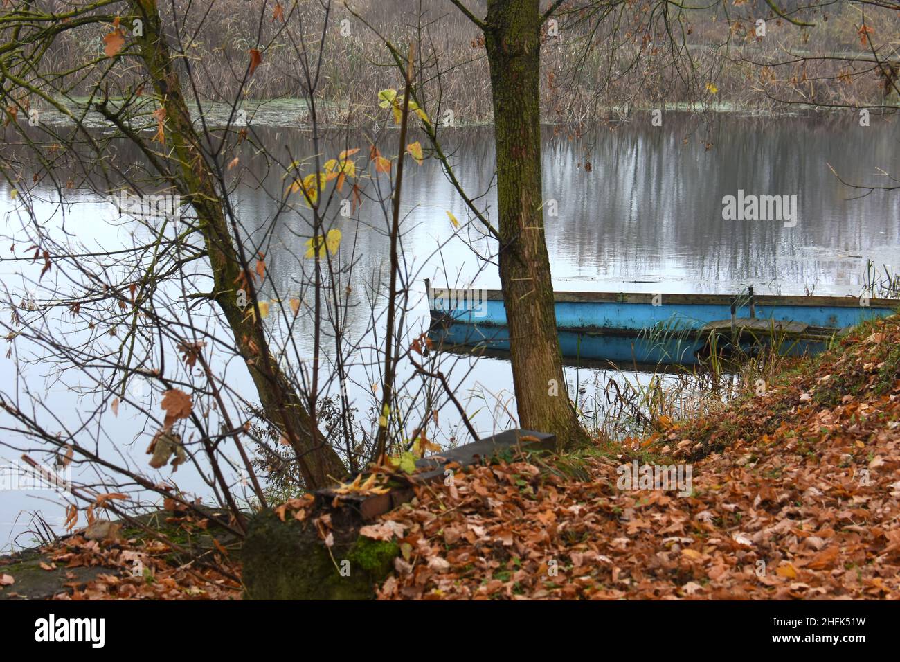 Lake River And Old Wooden Blue Fishing Boat Stock Photo - Alamy