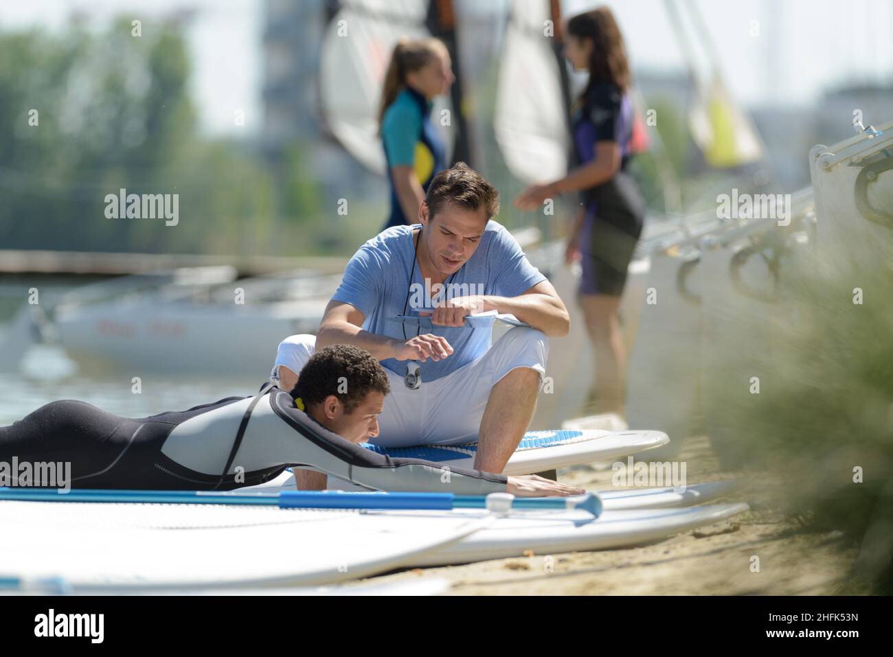 stand up paddle boards training Stock Photo Alamy