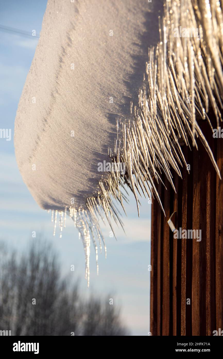 Dripping melting spring icicles, winter icon Stock Photo