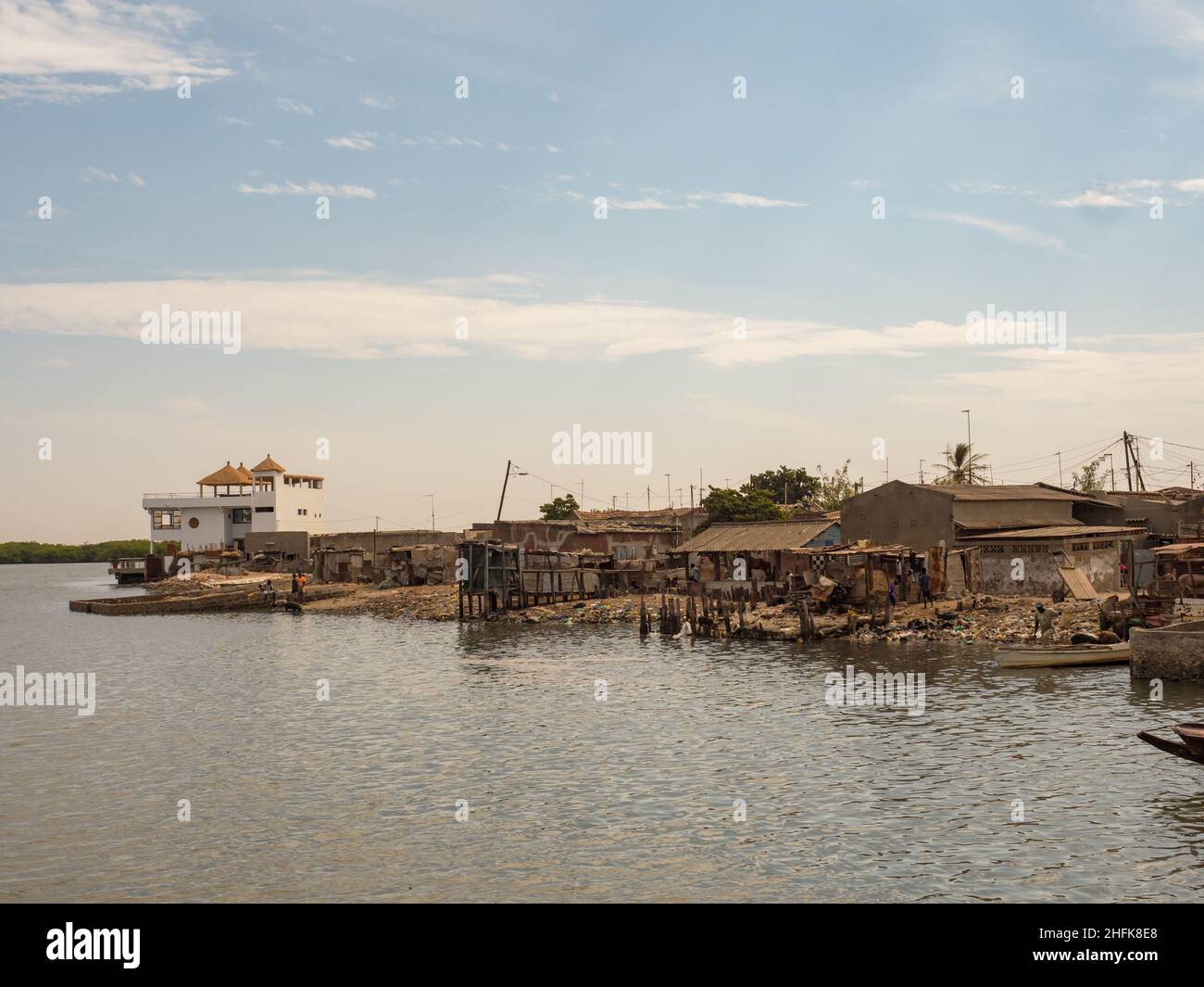 Joal-Fadiouth, Senegal - January 2019: Destroyed fisherman's houses. City of Joal-Fadiouth. A commune in the Thiès region at the end of the Petite Côt Stock Photo