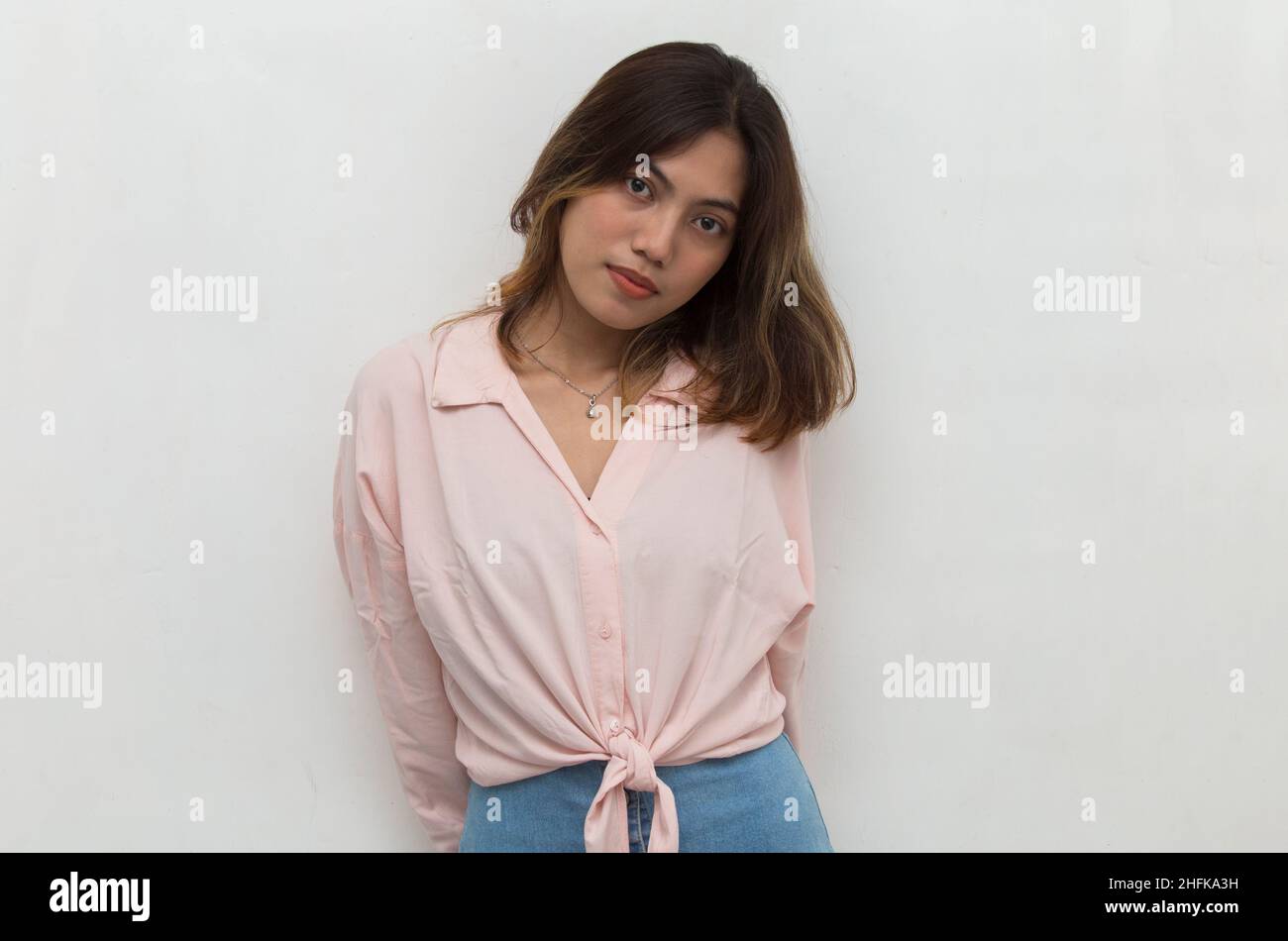 Portrait of a young asian woman on white background Stock Photo - Alamy