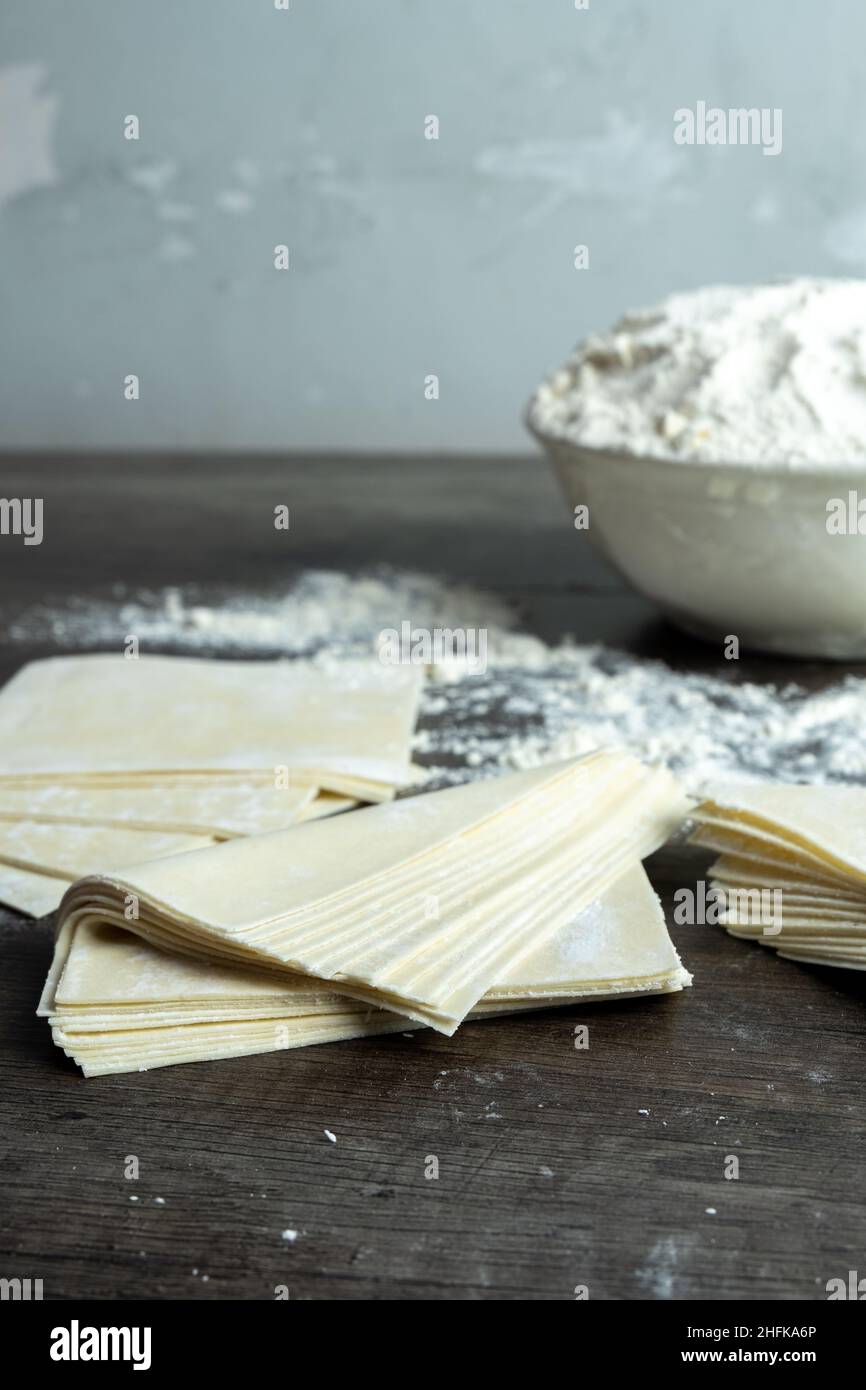spring roll skin, raw condition in the form of sheets, with a sprinkling of wheat flour to
