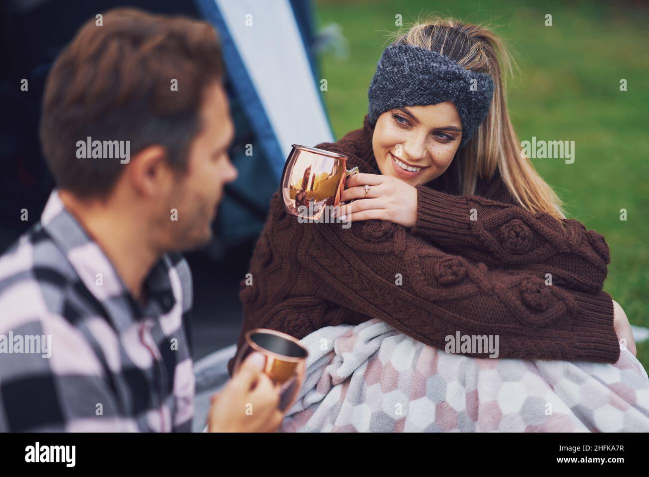 Young nice couple having fun on camping Stock Photo